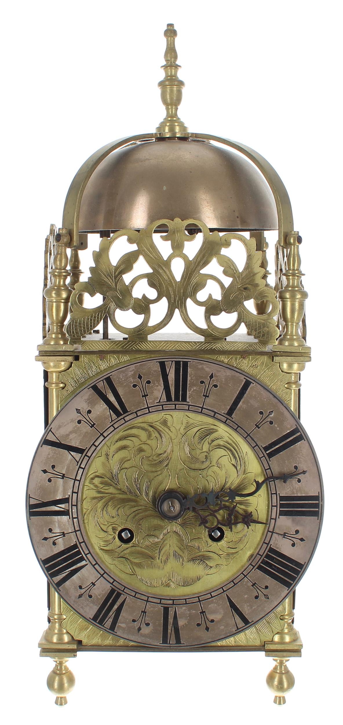 Brass lantern clock, the eight day ting-tang quarter strike on two bells and the movement back plate