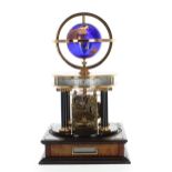 Royal Geographical Society Millennium electric clock, the top fitted with a cobalt blue and gilded