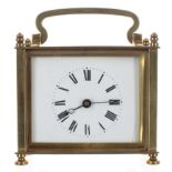 Unusual French carriage clock timepiece with fixed key wind, within a rectangular pillared brass