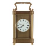 Carriage clock striking on a gong, the 1.75" white enamel dial within a gilt mask and angular