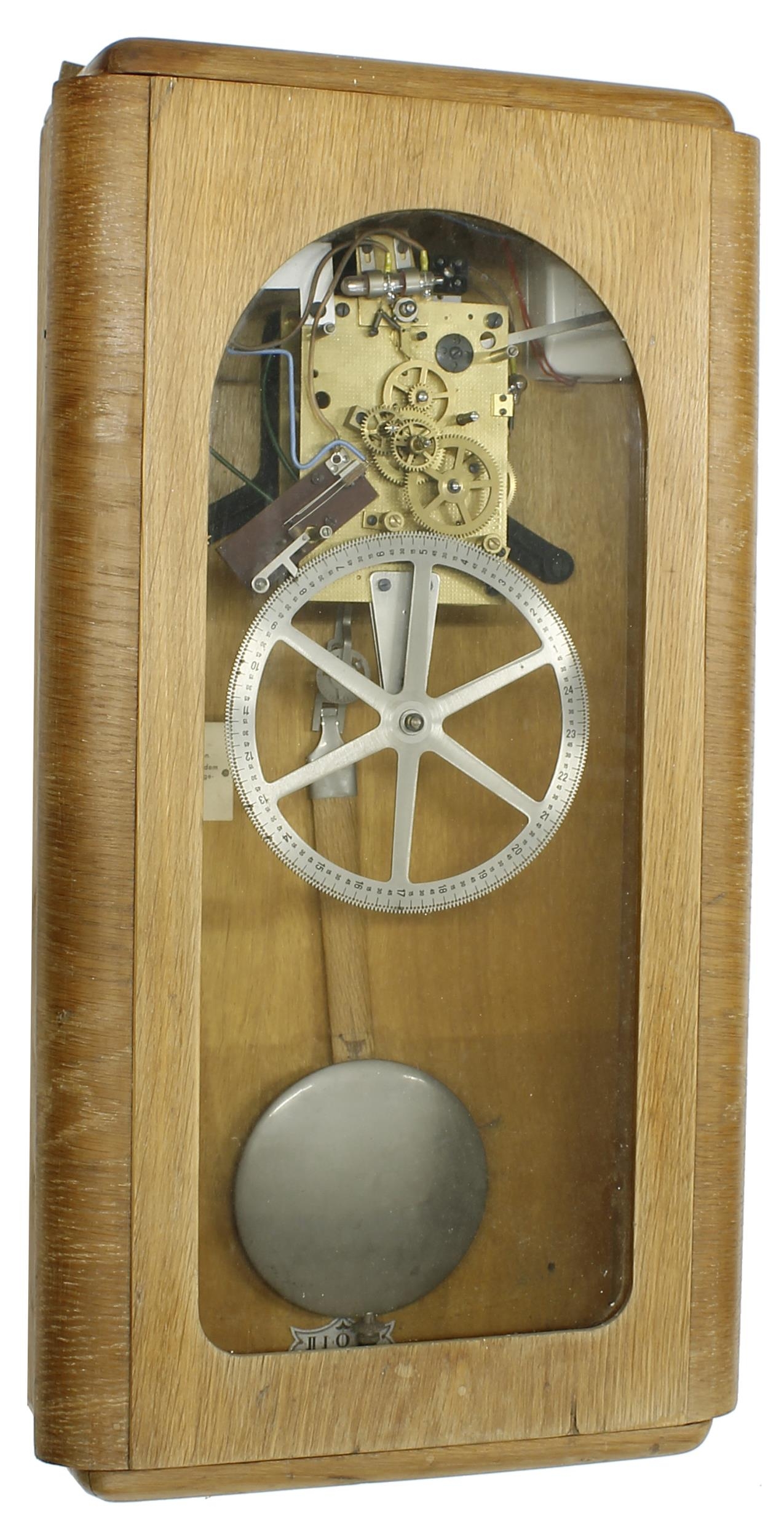 Electro-mechanical master wall clock, within an Art Deco glazed oak case, 27" high (pendulum)