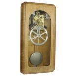 Electro-mechanical master wall clock, within an Art Deco glazed oak case, 27" high (pendulum)