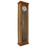 Gents electric master clock, the 6.25" silvered dial within a light walnut glazed case, 52.75"