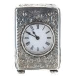 Edwardian silver cased boudoir mantel clock timepiece with fixed key wind, the 2" white dial