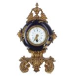 Small French gilt metal and cobalt blue pottery mantel clock timepiece with platform escapement, the