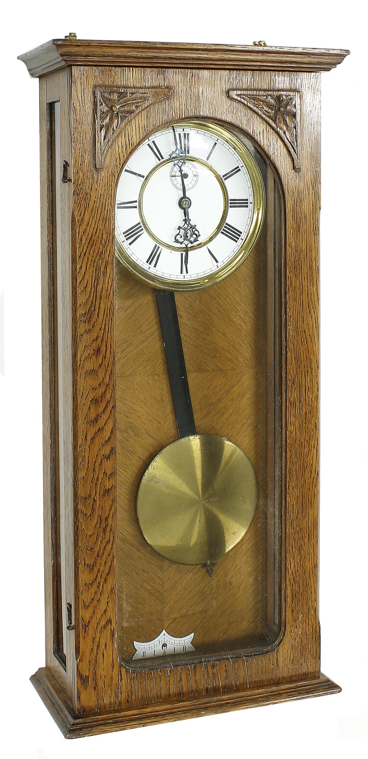 Oak cased Vienna style electro-mechanical wall clock, fitted with a rectangular brass plaque to