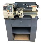 Axminster Sieg C4 metal bench lathe (part no: 600856), upon a bespoke stand fitted with a long
