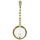 Fine Gibson Florentine five string banjo, bearing the Gibson Mastertone guarantee label to the