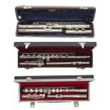 Three cased metal flutes by: J.R. Lafleur & Son Ltd, B & H 78 and J.M. Grassi (3)