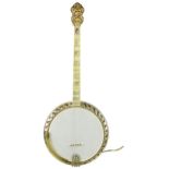 Fine Bacon & Day Silver Bell Montana four string banjo, inscribed on the brass ring guard B & D.