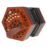 Lachenal & Co two row Anglo concertina, with twenty-one buttons on pierced mahogany ends, five-