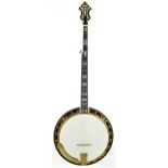 Recording King five string banjo, with 11" skin and geometric mother of pearl foliate inlay to the