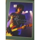 Ronnie Wood - autographed coloured photograph, glazed and framed, 13" x 11"