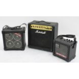 Roland Cube RX guitar amplifier; together with a Roland Micro Cube guitar amplifier and a Marshall
