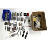 Large selection of metal guitar hardware including bridges, blocks, control plates, stop bars,