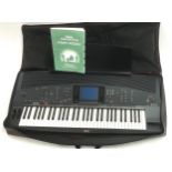 Yamaha Portatone PSR-4000 keyboard, with owners manual, spare floppy cards and carry-case *Please