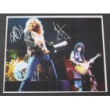 Robert Plant and Jimmy Page - autographed colour photograph, framed and glazed, 12.75" x 11.75" *