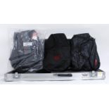 Heavy duty electric guitar flight case (currently uncut); together with three guitar gig bags