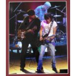 Ronnie Wood - autographed colour photograph, glazed and framed, 15" x 12"