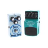 Belcat DLY-503 analogue delay guitar pedal; together with a Behringer CS100 compressor sustainer