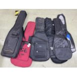 Seven various gig and soft guitar bags to include a PRS SE gig bag, a Warwick Rock Bag gig bag and a