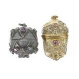 Ornate silver gilded floral embossed pendant pill box, with foliate designs and set with a pink