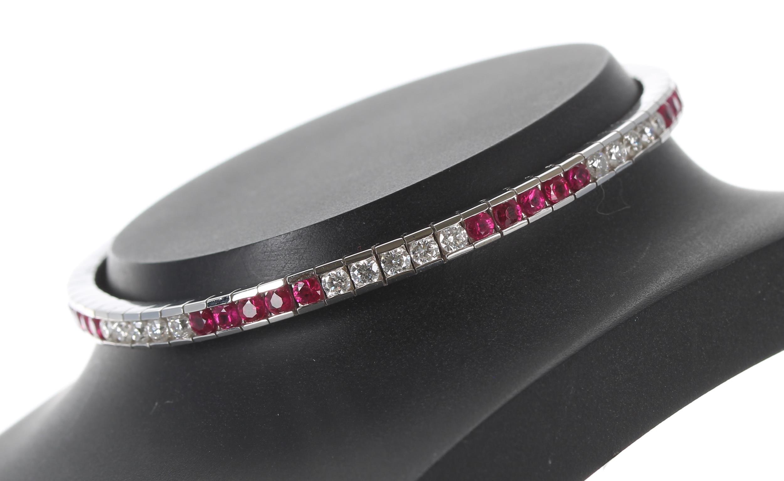 Fine quality modern 18ct white gold ruby and diamond channel set line bracelet, set with round - Image 2 of 2