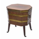 Georgian mahogany cellarette / wine cooler, brass bound with swing handles, raised on reeded