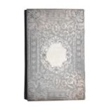 Victorian silver card purse, with dense foliate engraved  covers, the front with vacant cartouche,