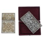 Intricate gilt metal openwork filigree card case, 2" x 3.5", within a morocco leather case; together
