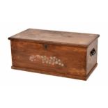 Elm blanket chest, with two cast iron handles, with painted floral stencil decoration to the top and