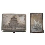 Chinese silver cigarette case, the hinged cover decorated with a temple, the push release butten set