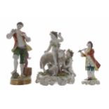 Volkstedt porcelain figural group of two winged putti with a sheep and lamb, modelled on a floral