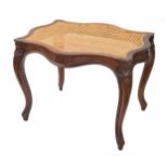 Victorian serpentine walnut dressing stool, with cane panelled seat raised on cabriole legs with