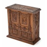 Decorative Black Forest type carved stationery box/writing slope, the architecturally carved top,