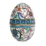 Russian silver and cloisonné egg, decorated with pink and blue flowers on a cream ground, dividing