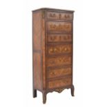 19th century French kingwood semanier (tall chest), the moulded marble top over canted chest of