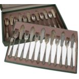 German cased set of twelve silver fish knives and forks, with monogrammed and crested handles,