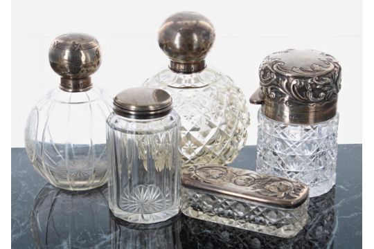 Selection of silver mounted glass bottles and jars; two globe scent bottles, tallest 4.75" high, a