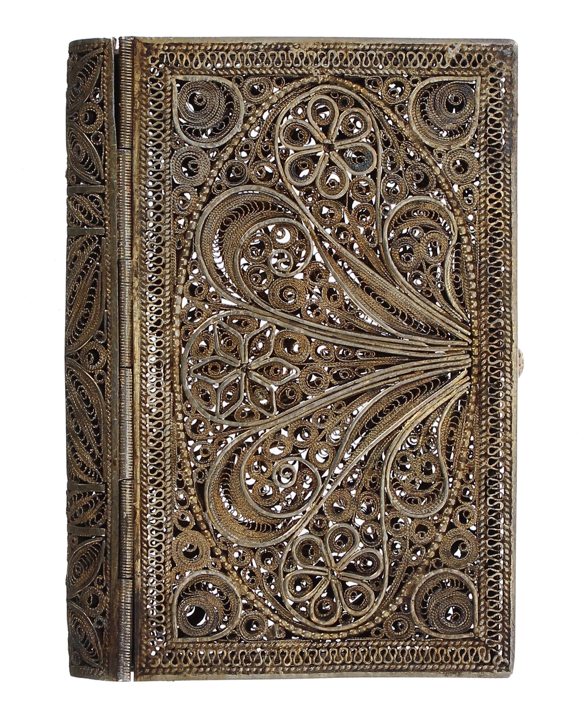Ornate gilt metal filigree card case modelled as a book, 2.25" x 3.5"