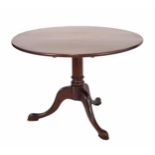 Georgian style circular mahogany breakfast table, raised on a central support over three cabriole
