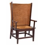 Early 20th century Orkney chair, with a curved rush back over an oak frame with rush seat, 24" wide,