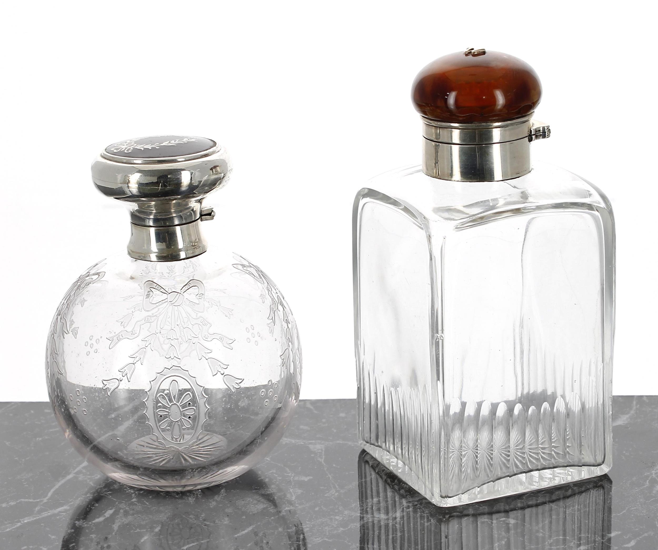 Silver mounted globe scent bottle, with tortoiseshell and piqué decorated cover enclosing an inner