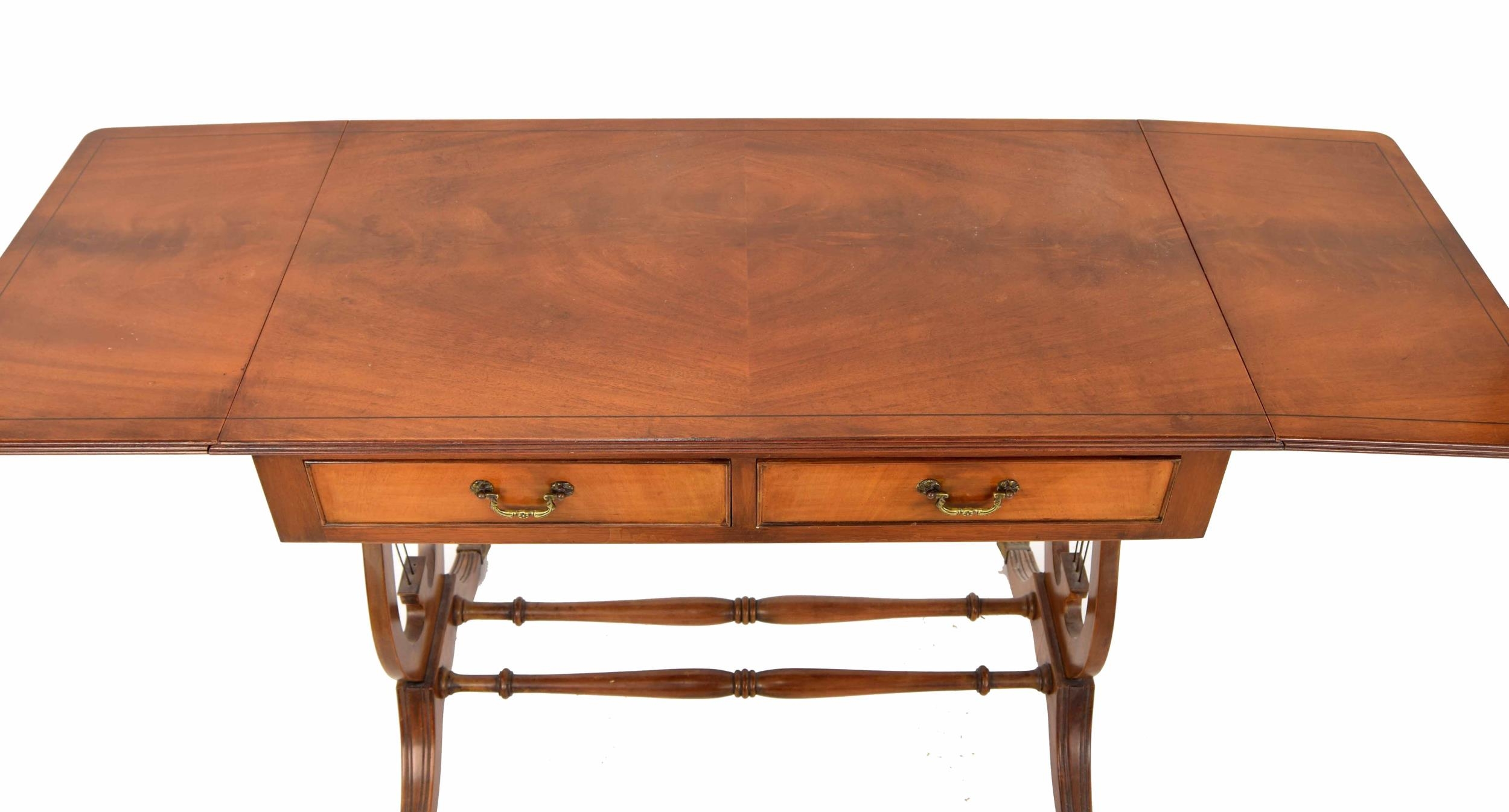 George III style reproduction mahogany sofa table, the drop leaf top over two short drawers raised - Image 2 of 2