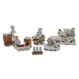 Set of five 19th century porcelain figural match strikers to include by Conta & Boehme, others