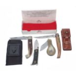 Selection of folding knives to include Conaz F. Consigli, Scarperia Italy, with original box and