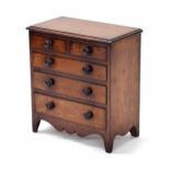 Miniature apprentice mahogany chest of short over three long graduated drawers, 8.25" wide, 4.75"