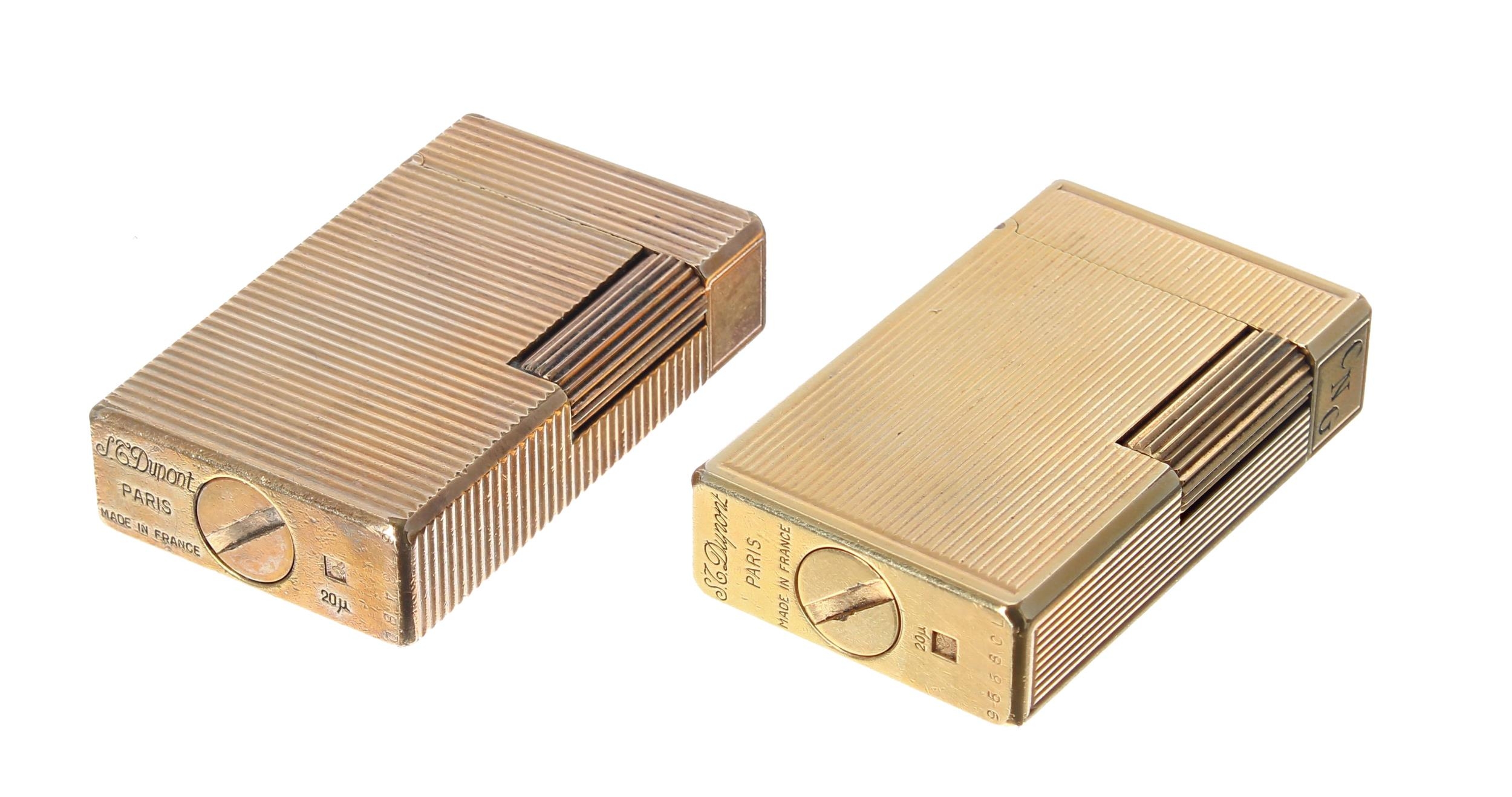 S.T. Dupont gold plated cigarette lighter, with horizontal fluted body, made in France, 2.25";