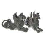 Pair of 19th century wood carvings of griffins, with verdigris bronze effect patination, 10" long,
