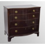 George III mahogany serpentine chest of drawers, the top with boxwood banding over four graduated